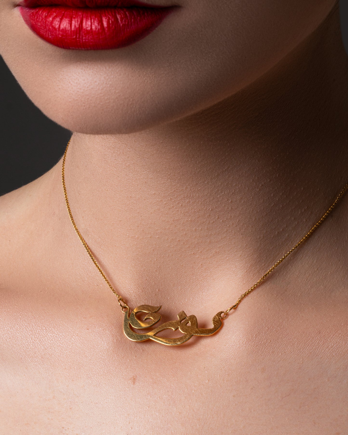 18K gold necklace in the name of