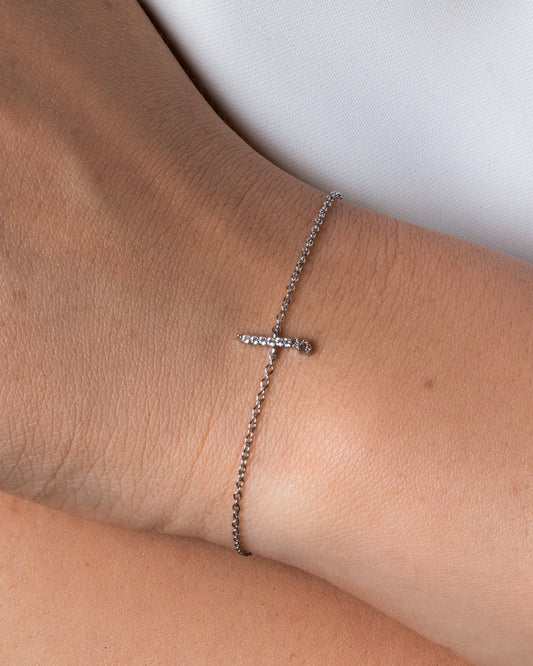 An 18k gold bracelet set with Lab Diamond, featuring the letter 'A'