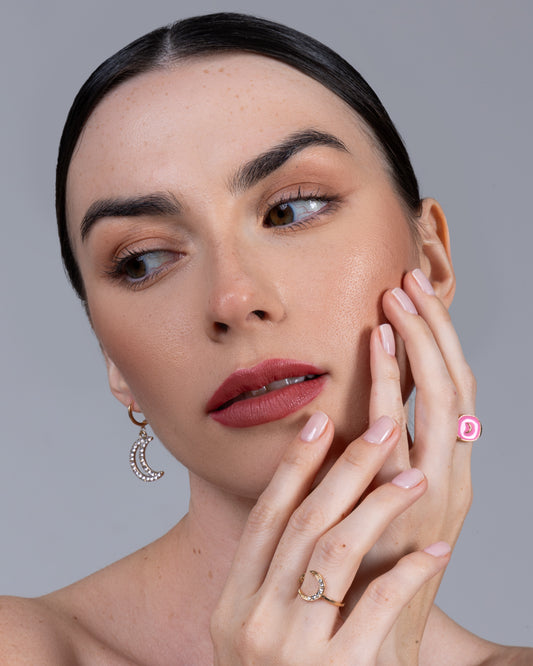 Open ring with a golden eclipse design and lab diamond